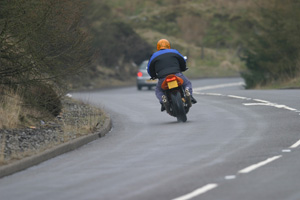 man riding a motorcycle