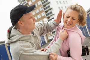 Man assaulting a woman