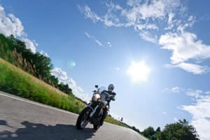 Motorcyclist riding on a rural road in Hackensack, NJ