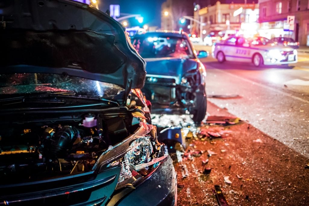 Two vehicles in a rear-end crash on a New York City highway