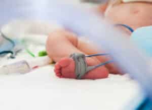 Baby with NEC in hospital care