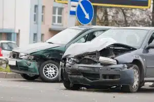 Collision between two cars on a city road.