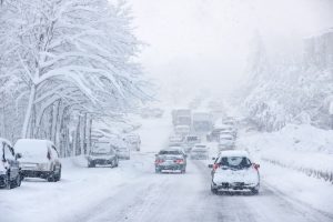 Navigating through a snowstorm with poor visibility, icy roads, and heavy traffic can be perilous.
