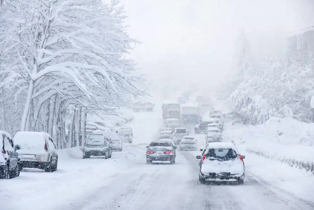 Navigating through a snowstorm with poor visibility, icy roads, and heavy traffic can be perilous.