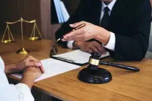 Consultation between a male lawyer and client.