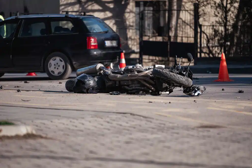 Motorcycle lying on road after an accident