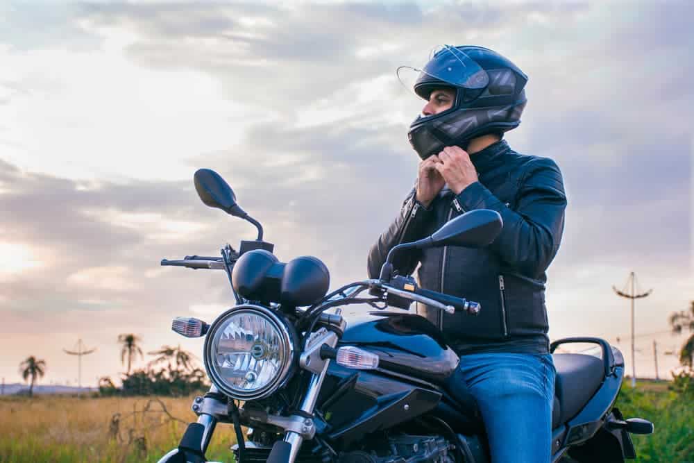 Man on his motorcycle wearing a helmet