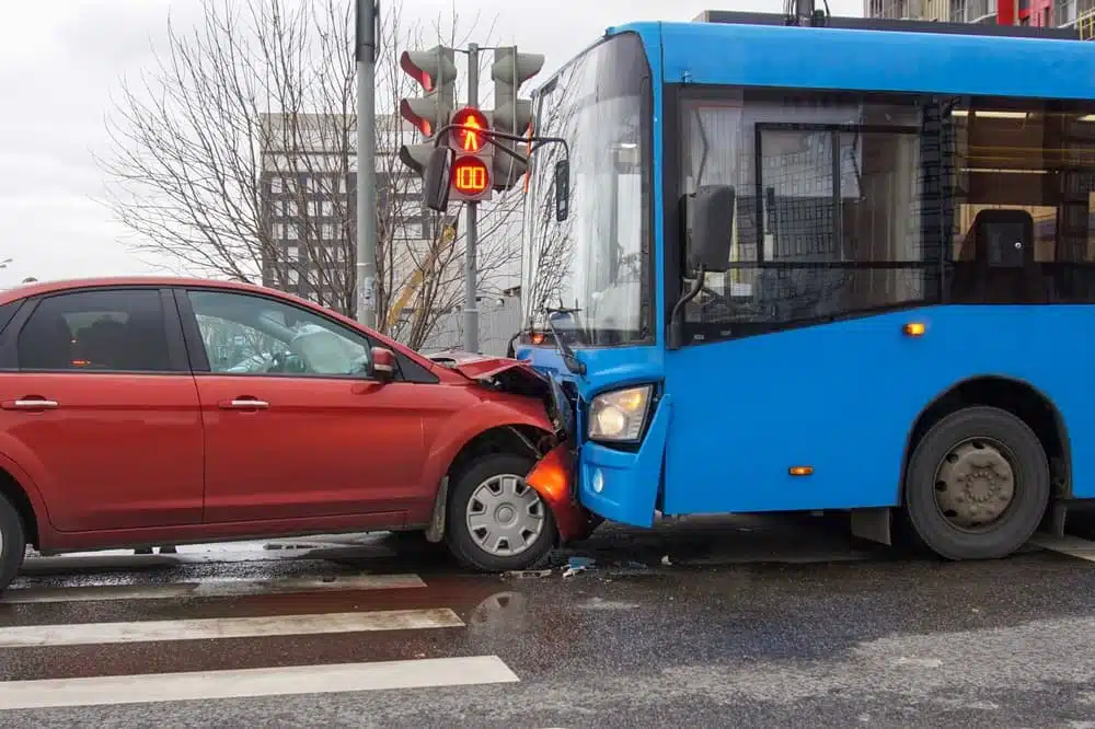 Head-on collision between bus and car.