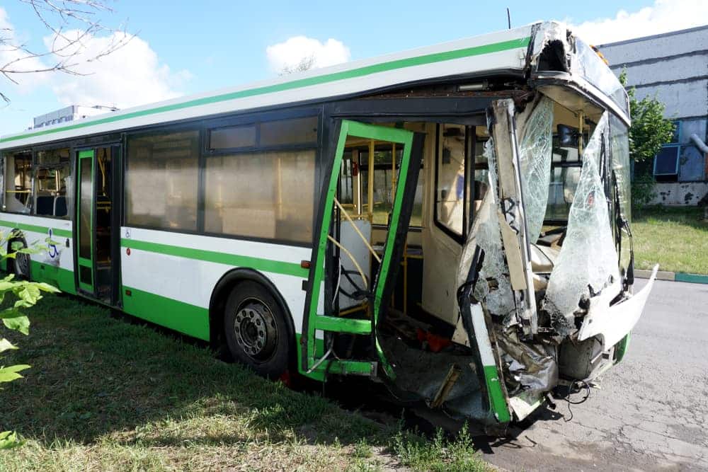 Broken in an accident the bus is in the Parking lot. The concept of careless driving.