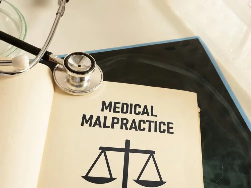 Medical malpractice negligence is shown using a text