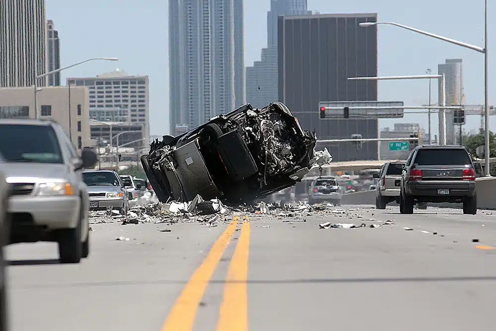 Car crashed into the side of a building, illustrating serious Lyft accidents near Philadelphia International Airport and the question of who pays for the damages.